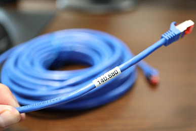 Explicit labeling of thin fiber optic cables, patch cables or thicker power cords.